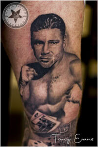 Black and grey portrait tattoo